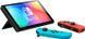 Игровая приставка Nintendo Switch OLED Neon Red & Blue Joy-Con Фото №3